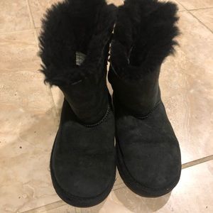 Kids uggs size 1 black with black bows on back